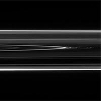 Saturn's D ring--the innermost of the planet's rings--sports an intriguing structure that appears to be a wavy, or 'vertically corrugated,' spiral. Image credit: NASA/JPL/Space Science Institute.