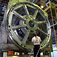 Workers install the 100,000 pound magnet for testing at the University of Illinois prior to the G-Zero experiment at Thomas Jefferson National Accelerator Facility in Newport News, Va.<BR><BR>University of Illinois photo 
