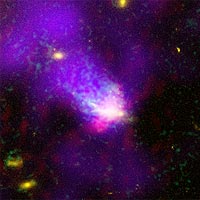 Composite image of the galaxy C153 (X-ray Images: NASA/CXC/SAO/UMass/D. Wang et al. Optical: NASA/STScI/U. Alabama/W. Keel Radio: NRAO/ F. Owen Optical (OII): Gemini Obs./M. Ledlow) 