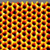 <p>
	This image of a single suspended sheet of graphene taken with the TEAM 0.5, at Berkeley Lab’s National Center for Electron Microscopy shows individual carbon atoms (yellow) on the honeycomb lattice.</p>
