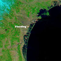 <p>
	Coastal flooding from the March 11, 2011 tsunami triggered by a magnitude 8.9 earthquake off Japan's northeast coast can be seen in this image from the NASA's Terra spacecraft.</p>
<p>
	Image credit: NASA/GSFC/LaRC/JPL</p>
