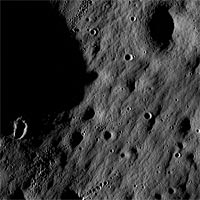 This image shows cratered regions near the moon's Mare Nubium region, as photographed by the Lunar Reconnaissance Orbiter's LROC instrument. Impact craters feature prominently. Older craters have softened edges, while younger craters appear crisp.Iimage shows a region 1,400 meters (0.87 miles) wide, and features as small as 3 meters (9.8 feet) wide can be discerned. The bottom of image faces lunar north.<br /><br />Credit: NASA/Goddard Space Flight Center/Arizona State University