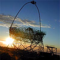 The Magic Telescope (Major Atmospheric Gamma Imaging Cherenkov telescope). The telescope is located La Palma island, 2200 meters above the sea level at the Observatory Roque de los Muchachos, of the Itituto Astrofisico de Canarias. 

© Copyright 2002 INFN 