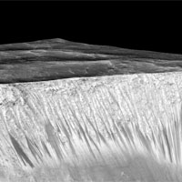 <p>Mars’ Valles Marineris canyon, pictured, spans as much as 600 kilometers across and delves as much as 8 kilometers deep. The image was created from over 100 images of Mars taken by Viking Orbiters in the 1970s.</p>

<p>Image: NASA</p>
