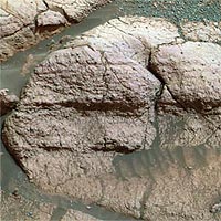 Taken by the panoramic camera on the Mars Exploration Rover Opportunity, image shows a close up of the rock dubbed 'El Capitan.' The iron-bearing mineral jarosite, which was found in the rock, led MIT and Harvard researchers to posit that early Mars may have had the greenhouse gas sulfur dioxide in its atmosphere.<br /><br />Image / NASA/JPL/Cornell