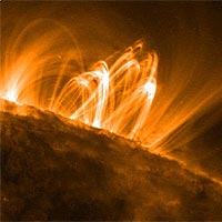 Close-up images reveal an active surface with coronal loops emerging and disappearing all over the Sun's surface and can span a length of about 250,000 miles, or about 30 times the diameter of Earth. 
<P>
Taken by the Solar and Heliospheric Observatory (SOHO) spacecraft on April 21.
<P>
SUPER: NASA / LMSAL