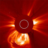 Outburst of gas from near the Sun’s south pole. The bright loop is cool, strongly magnetized material being swept away from the Sun. The white ring inside the central mask shows the size of the visible Sun. 
<P>
Credits: SOHO/LASCO