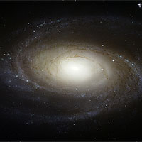 This new image of the nearby spiral galaxy Messier 81, taken by NASA's Hubble Space Telescope, shows stunning detail in a galaxy that resembles the Milky Way in many ways. This color composite was assembled from images taken in blue, visible, and infrared light. Credit: NASA, ESA, and the Hubble Heritage Team (STScI/AURA)