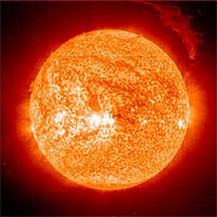 On Friday, 12 March 2004, the Sun ejected a spectacular 'eruptive prominence', or mass of relatively cool plasma, into the heliosphere. Relatively cool, because the plasma observed by the Extreme-ultraviolet Imaging Telescope (EIT) on board the Solar and Heliospheric Observatory (SOHO) was only 60 000 - 80 000 degrees Celsius, unlike the 1.5 - 2 million degrees Celsius plasma surrounding it in the Sun's tenuous outer atmosphere, or 'corona'. At the time of this snapshot, taken in the light of singly-ionised helium, the eruptive prominence was over 700 000 km across - over fifty times Earth's diameter - and was moving in excess of 75 000 km per hour. 
<P>
Credits: ESA/NASA