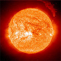 On Friday, 12 March 2004, the Sun ejected a spectacular 'eruptive prominence', or mass of relatively cool plasma, into the heliosphere. Relatively cool, because the plasma observed by the Extreme-ultraviolet Imaging Telescope (EIT) on board the Solar and Heliospheric Observatory (SOHO) was only 60 000 - 80 000 degrees Celsius, unlike the 1.5 - 2 million degrees Celsius plasma surrounding it in the Sun's tenuous outer atmosphere, or 'corona'. At the time of this snapshot, taken in the light of singly-ionised helium, the eruptive prominence was over 700 000 km across - over fifty times Earth's diameter - and was moving in excess of 75 000 km per hour. 
<P>
Credits: ESA/NASA