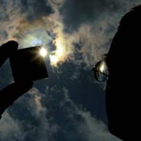 Thin-film solar cell in researcher's hand.