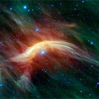 <p>
	The blue star near the center of this image is Zeta Ophiuchi. When seen in visible light it appears as a relatively dim red star surrounded by other dim stars and no dust. Image credit: NASA/JPL-Caltech/UCLA</p>
