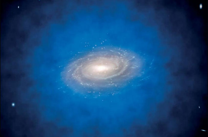 <p>Artist’s impression of a spiral galaxy embedded in a larger distribution of invisible dark matter, known as a dark matter halo (coloured in blue). Studies looking at the formation of dark matter haloes have suggested that each halo could harbour a very dense nucleus of dark matter, which may potentially mimic the effects of a central black hole, or eventually collapse to form one.</p>

<p>ESO / L. Calçada</p>

<p>Licence type</p>

<p>Attribution (CC BY 4.0)</p>
