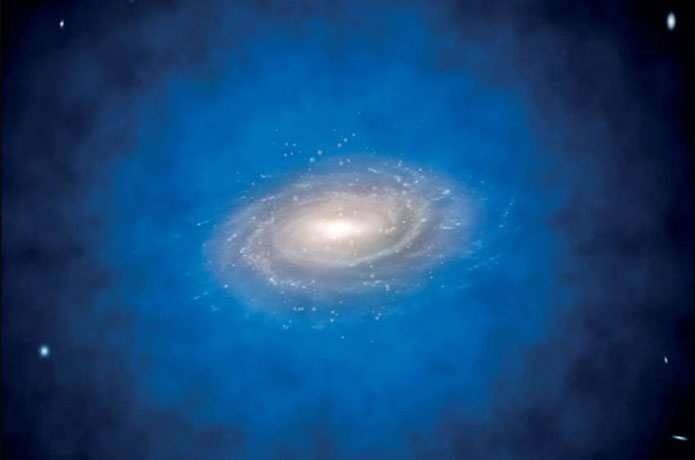 <p>Artist’s impression of a spiral galaxy embedded in a larger distribution of invisible dark matter, known as a dark matter halo (coloured in blue). Studies looking at the formation of dark matter haloes have suggested that each halo could harbour a very dense nucleus of dark matter, which may potentially mimic the effects of a central black hole, or eventually collapse to form one.</p>

<p>ESO / L. Calçada</p>

<p>Licence type</p>

<p>Attribution (CC BY 4.0)</p>
